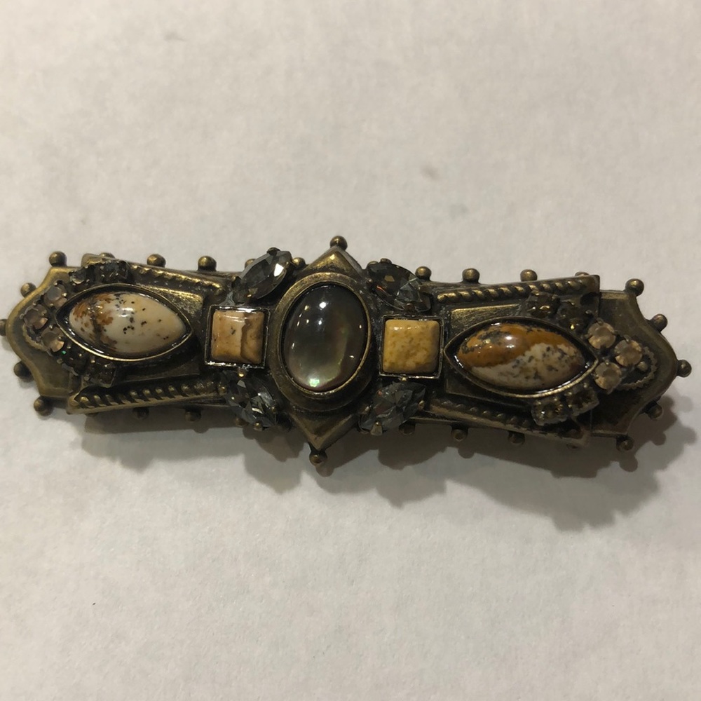 Antique looking brooch with semiprecious stones